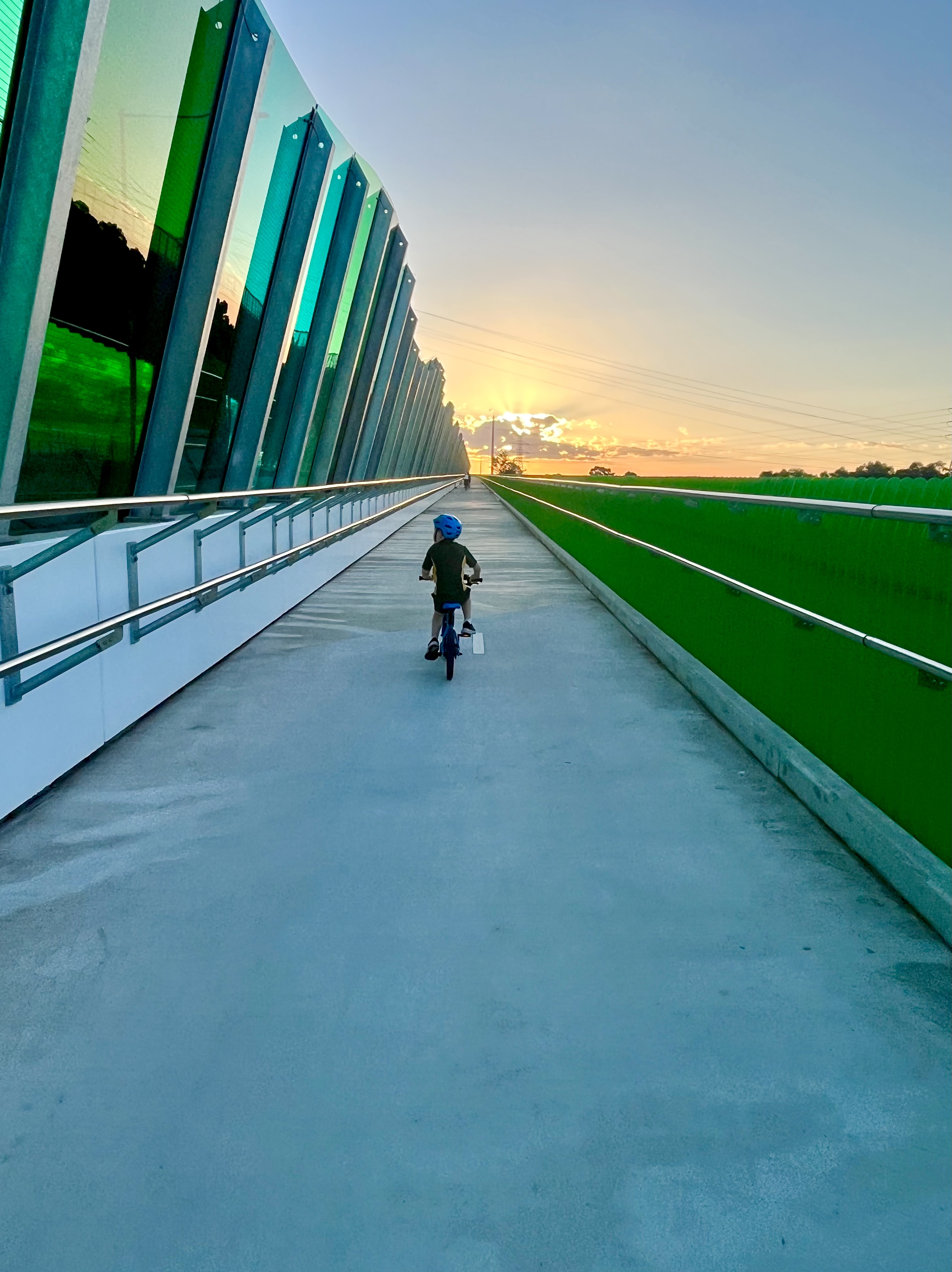 Five-year-old boy riding his bike over the Stony Creek veloway in Spotswood